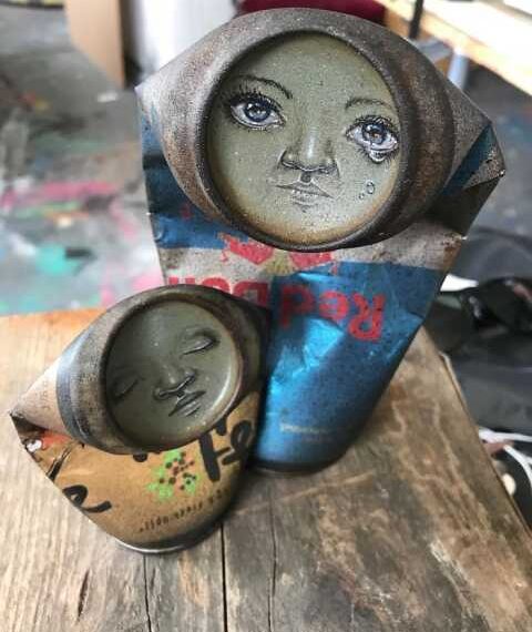 Вуличне мистецтво на старих алюмінієвих та жерстяних банках